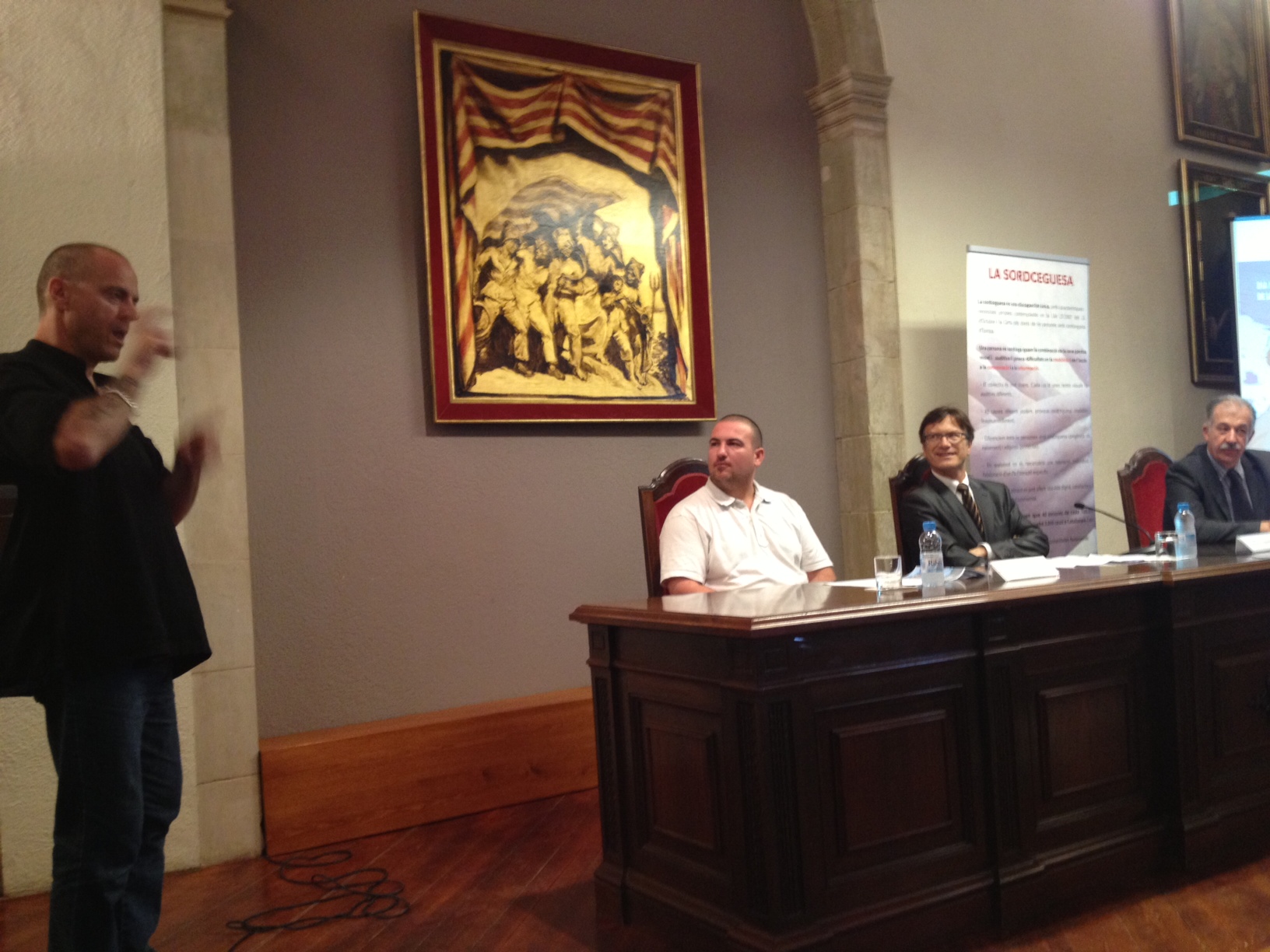 Carlos Martínez exposant la seva experiència personal. Acompanyat de David Puigdeslloses; 