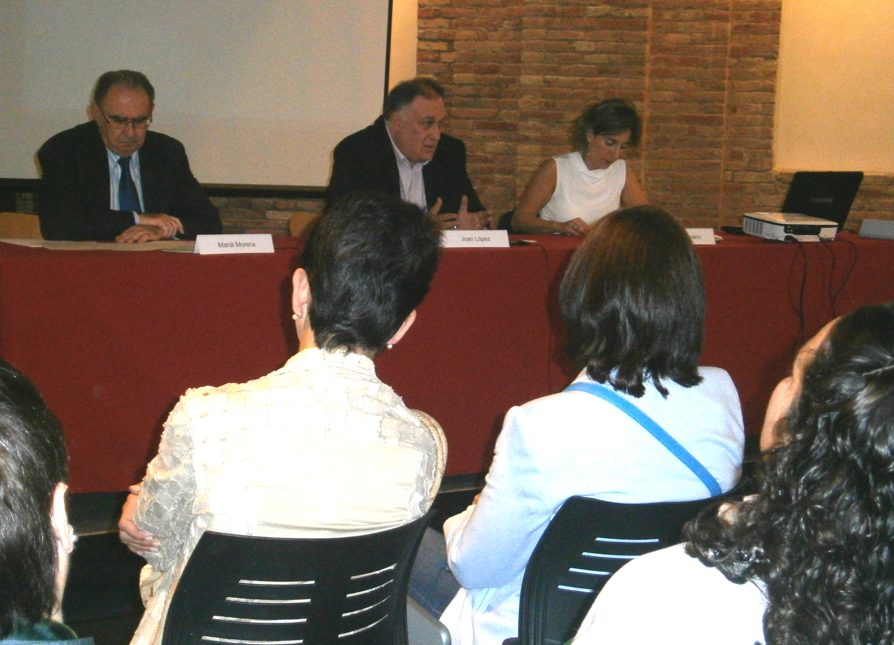 Marià Morera, Joan López i Carol i Ivet Castaño en un moment de la inauguració de la jornada